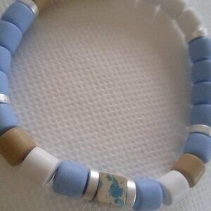 Bacelet...stretch bracelet, center mini cube bead, 7 1/2 inches